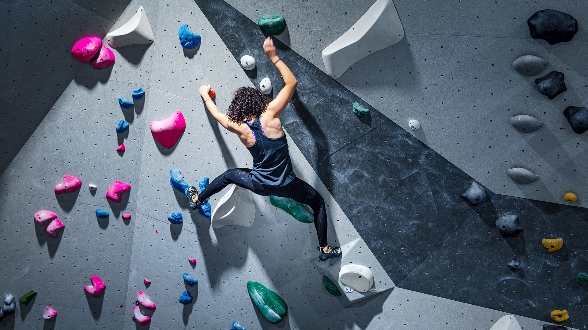 person wall climbing